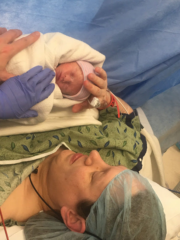 first time holding newborn