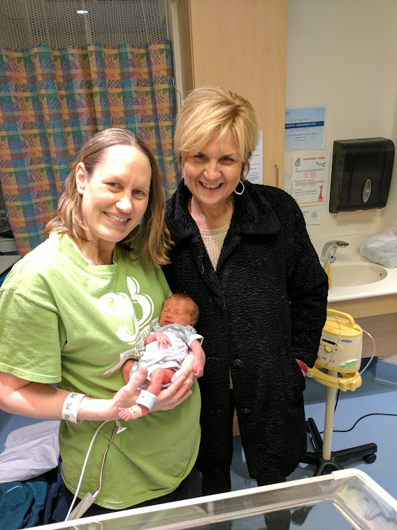 lady visiting mom and baby in NICU