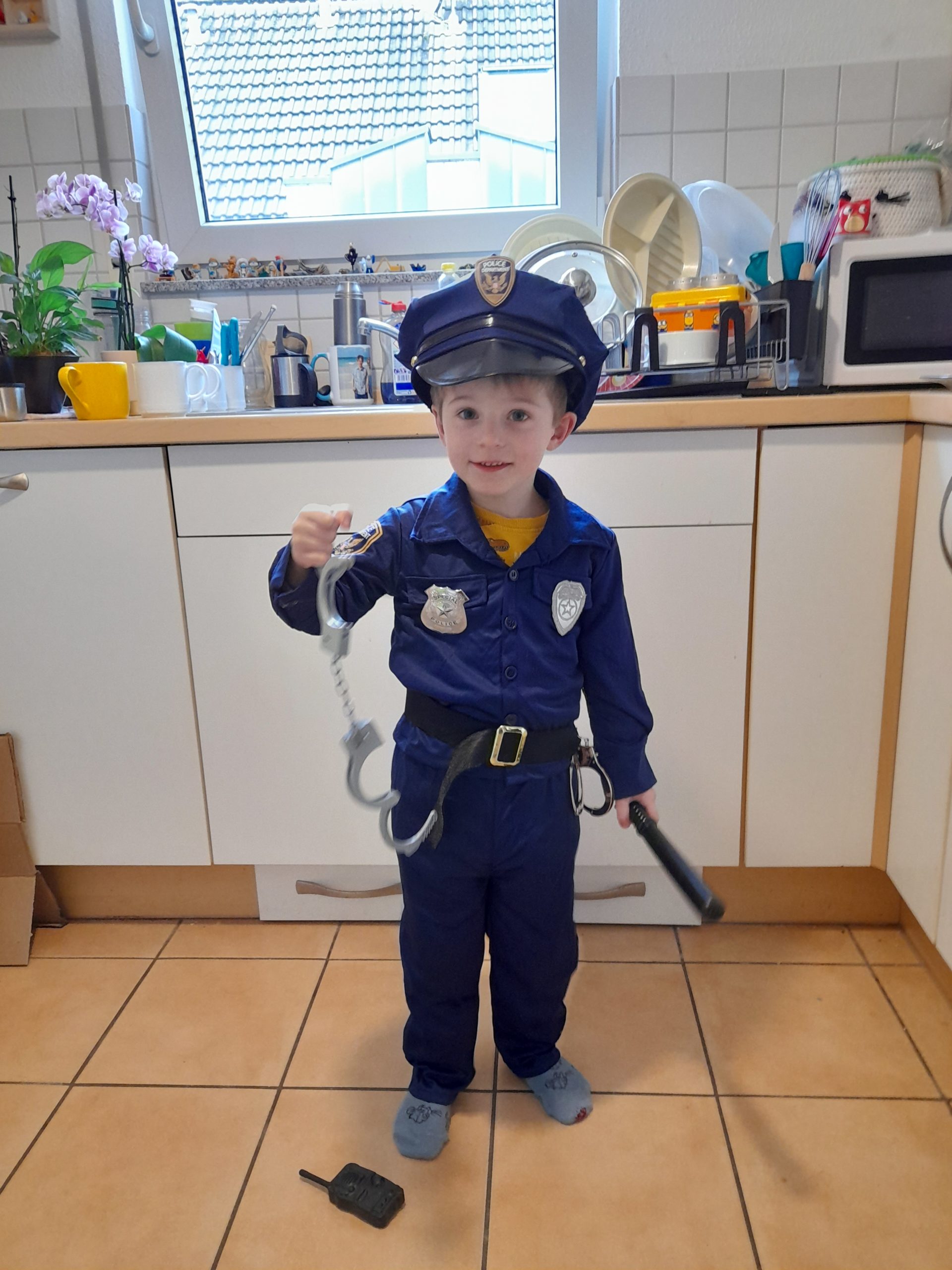 boy disguised as policeman
